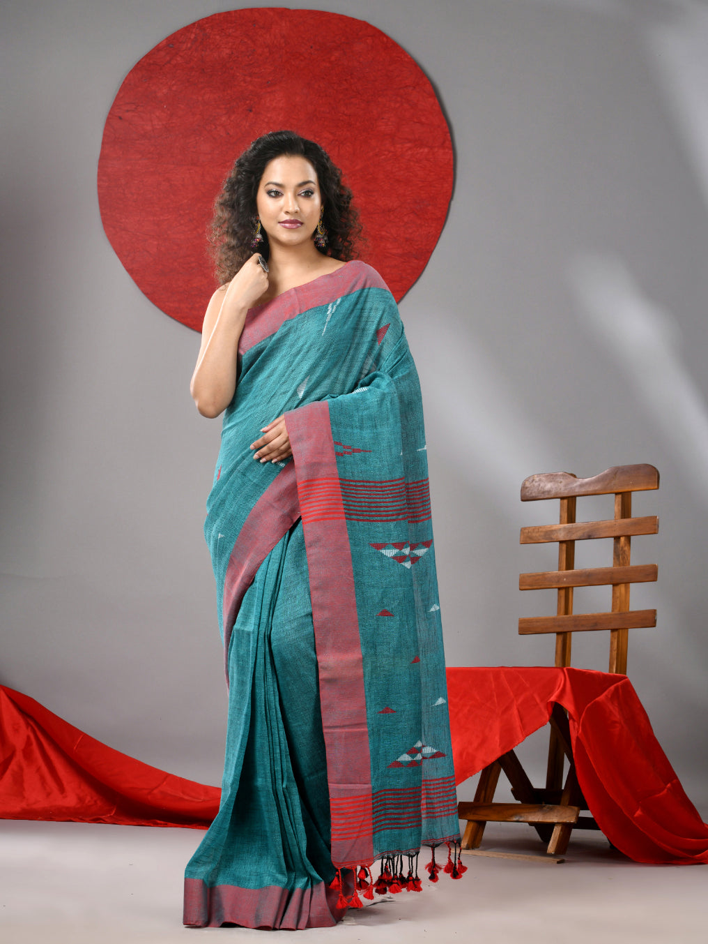 Teal Linen Saree With Woven Designs