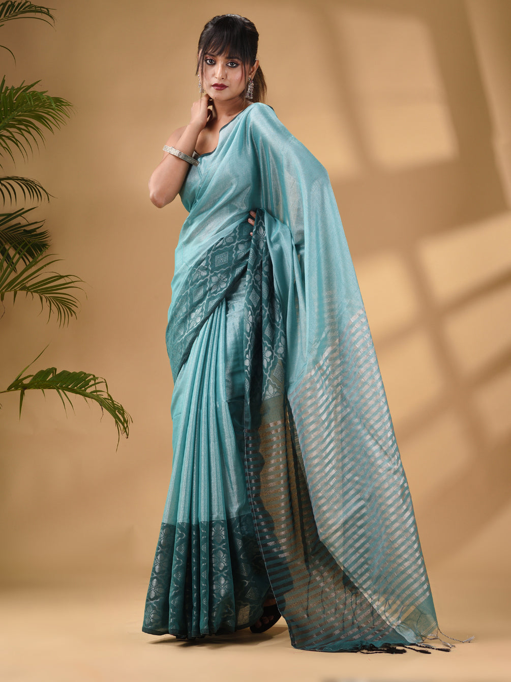 Teal Tissue Handwoven Saree With Texture Border