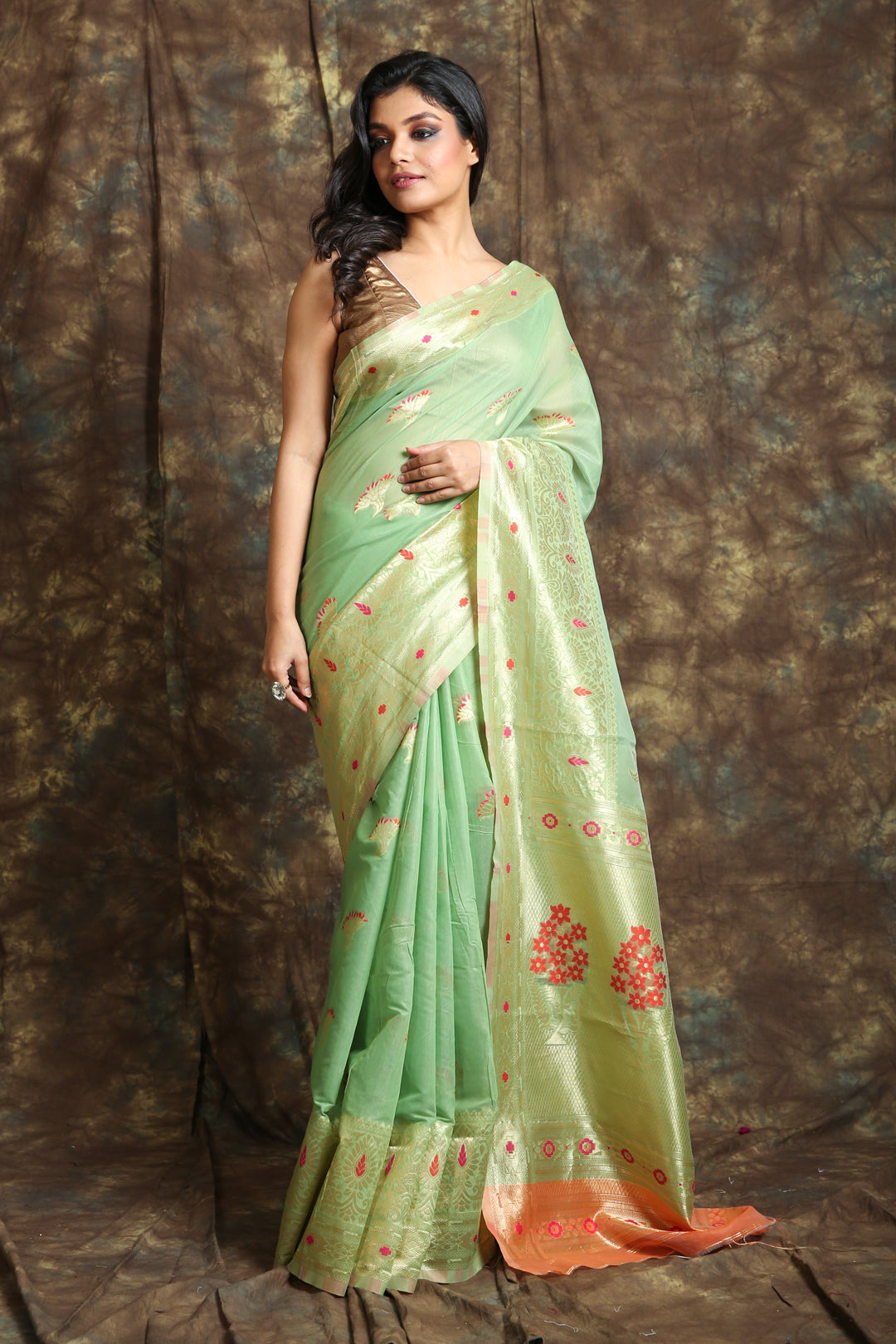 Pista Green Woven Silk Saree